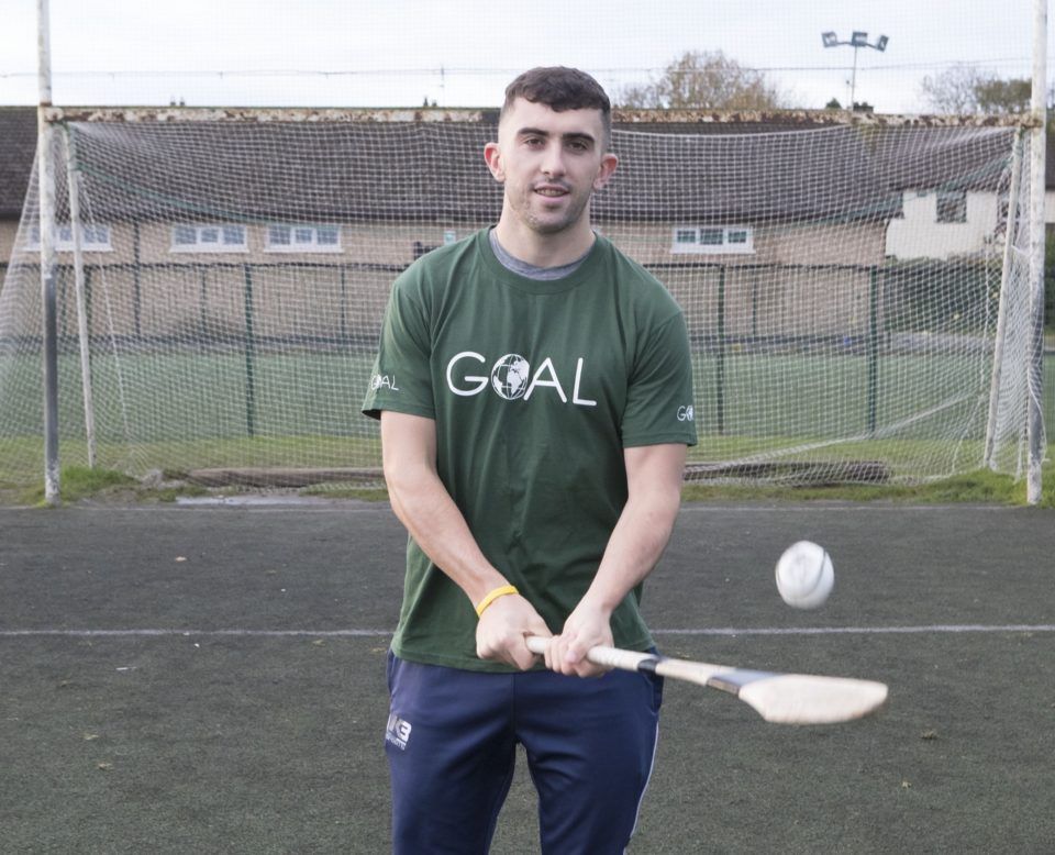 With Compliments. Limerick hurling hero and 2019 All-Star, Aaron Gillane, has been named as an Ambassador for humanitarian relief and development agency, GOAL. The 23-year-old superstar was unveiled as an Ambassador by GOAL at Patrickswell GAA Club this Tuesday.  Photograph Liam Burke/Press 22    Aaron joins an elite team of GOAL sports ambassadors who include another Limerick sporting sensation, hockey hero Roisin Upton, who was part of the Irish ladies hockey team that qualified for the Tokyo Olympics in a thrilling game against Canada over the weekend.   Aaron joined Patrickswell GAA Club at a young age and has played for his county at minor, under-21 and senior level. He scored three points in Limerick’s first All-Ireland Hurling Final victory in 45 years in 2018.  GOAL CEO, Siobhan Walsh, said Aaron is an absolute inspiration to the GOAL team, and to so many young people. His achievements are the result of a lot of hard work, commitment, determination and honing of his special skills as an incredible sportsman. “He has sacrificed on his ambitious and impressive journey and sets a great example for all of us. What a great honor it is for us to have Aaron join the GOAL family and to become part of a global movement to create a better world for all. “ She added: “GOAL works in 13 countries throughout Africa, the Middle East and Latin America providing emergency relief, essential healthcare, nutrition education and developing sustainable livelihoods. Ambassadors play a vital role in the organisation by sharing GOAL’s story and why it matters, and we look forward to tapping into Aarons skills in working with youth in the weeks and months ahead.”   The global challenges we face in the world today are enormous and there are no easy fixes. And by being a member of the GOAL team, our Ambassadors such as Aaron are playing a very important role in creating this change.”   Aaron spoke about his delight at being a GOAL ambassador: ‘It’s great to work with