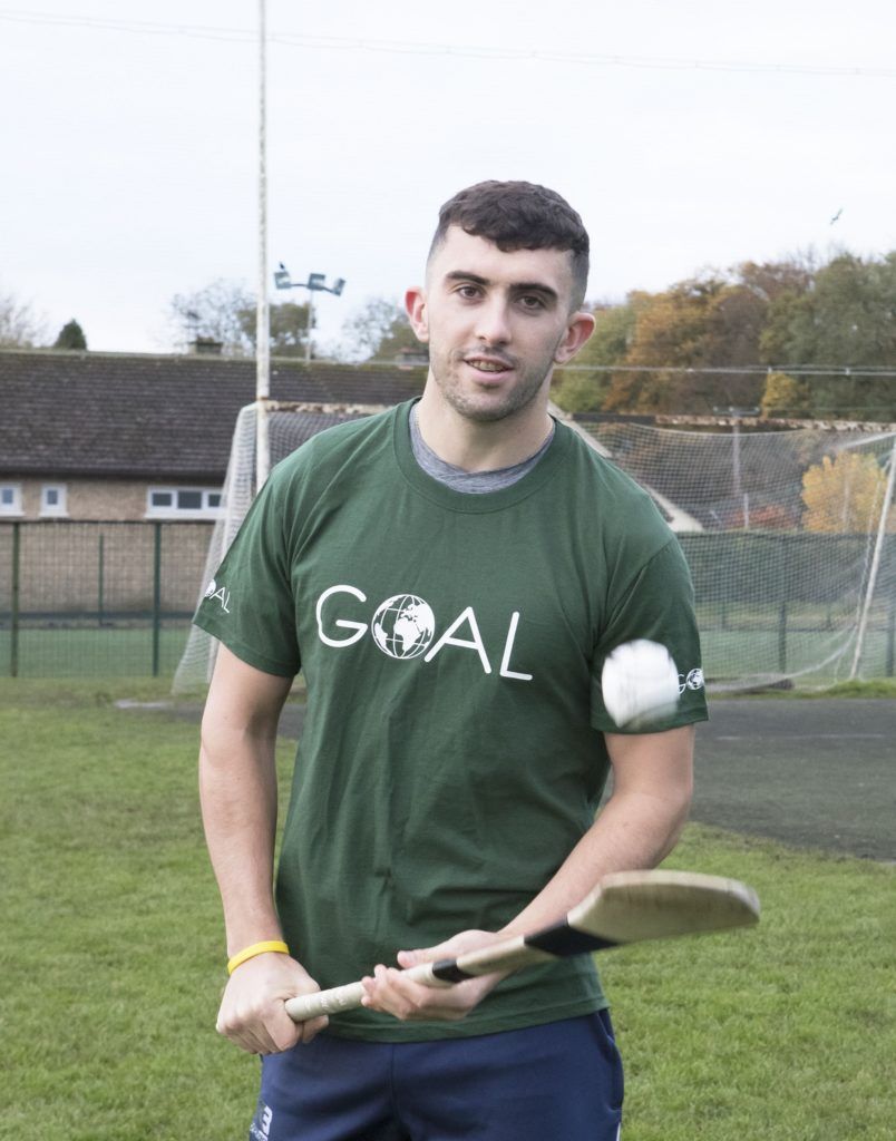 With Compliments. Limerick hurling hero and 2019 All-Star, Aaron Gillane, has been named as an Ambassador for humanitarian relief and development agency, GOAL. The 23-year-old superstar was unveiled as an Ambassador by GOAL at Patrickswell GAA Club this Tuesday.  Photograph Liam Burke/Press 22    Aaron joins an elite team of GOAL sports ambassadors who include another Limerick sporting sensation, hockey hero Roisin Upton, who was part of the Irish ladies hockey team that qualified for the Tokyo Olympics in a thrilling game against Canada over the weekend.   Aaron joined Patrickswell GAA Club at a young age and has played for his county at minor, under-21 and senior level. He scored three points in Limerick’s first All-Ireland Hurling Final victory in 45 years in 2018.  GOAL CEO, Siobhan Walsh, said Aaron is an absolute inspiration to the GOAL team, and to so many young people. His achievements are the result of a lot of hard work, commitment, determination and honing of his special skills as an incredible sportsman. “He has sacrificed on his ambitious and impressive journey and sets a great example for all of us. What a great honor it is for us to have Aaron join the GOAL family and to become part of a global movement to create a better world for all. “ She added: “GOAL works in 13 countries throughout Africa, the Middle East and Latin America providing emergency relief, essential healthcare, nutrition education and developing sustainable livelihoods. Ambassadors play a vital role in the organisation by sharing GOAL’s story and why it matters, and we look forward to tapping into Aarons skills in working with youth in the weeks and months ahead.”   The global challenges we face in the world today are enormous and there are no easy fixes. And by being a member of the GOAL team, our Ambassadors such as Aaron are playing a very important role in creating this change.”   Aaron spoke about his delight at being a GOAL ambassador: ‘It’s great to work with