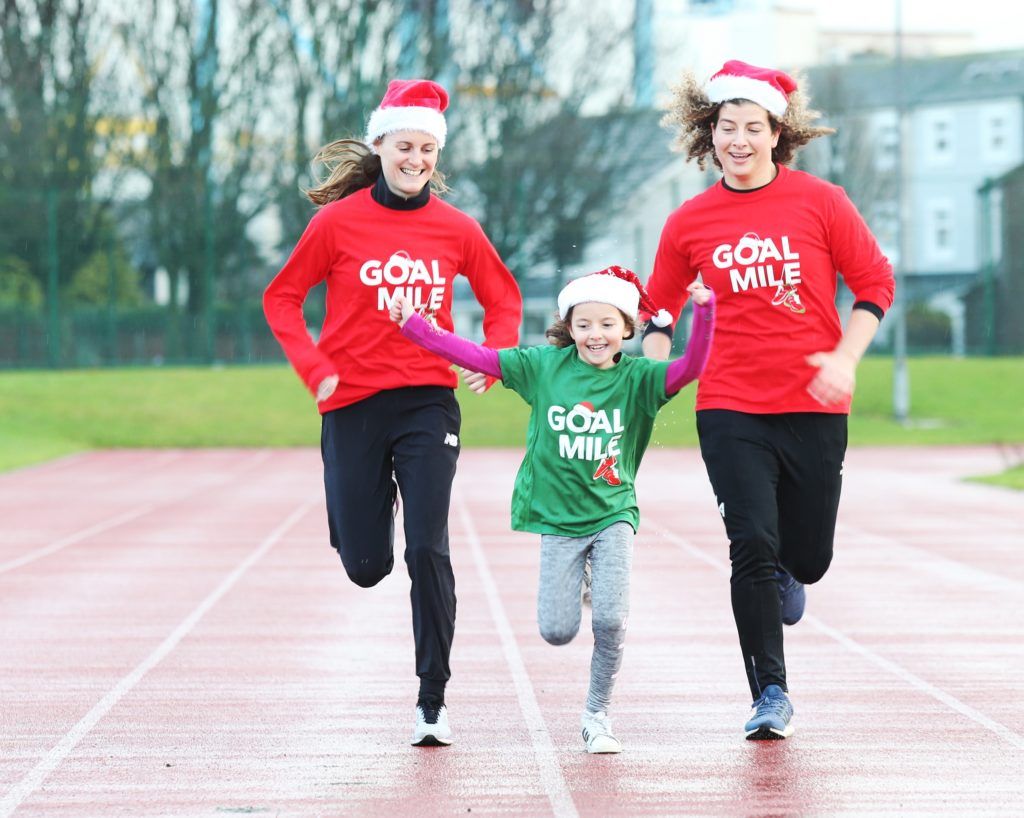 NO REPRO FEE 12/12/2019 GOAL ambassadors, Rugby international, Jenny Murphy  and middle distance running champion, Ciara Mageean race againt  Little Saoirse Moore 7yrsat the  launch the of this years GOAL mile in the iconic Irishtown Stadium in Dublin. Now in its 38th year, the GOAL Mile is one of Ireland’s largest and longest-running annual fundraising events and organisers revealed today that they are expecting  a record number of people to take part this year. All GOAL Miles are listed at goalmile.org with dates and times.Photo: Leon Farrell/Photocall Ireland.