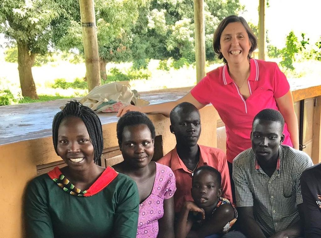 GOAL’s Head of Monitoring and Evaluation, Dr. Enida Friel visiting a community in Zimbabwe