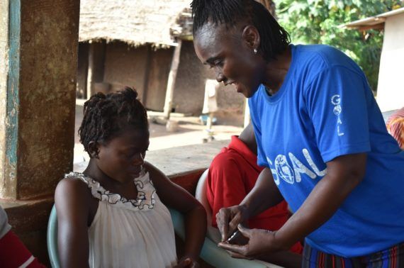 Picture1 Kenema in community dialogue session with a GOAL facilitator demonstrating contraceptive methods