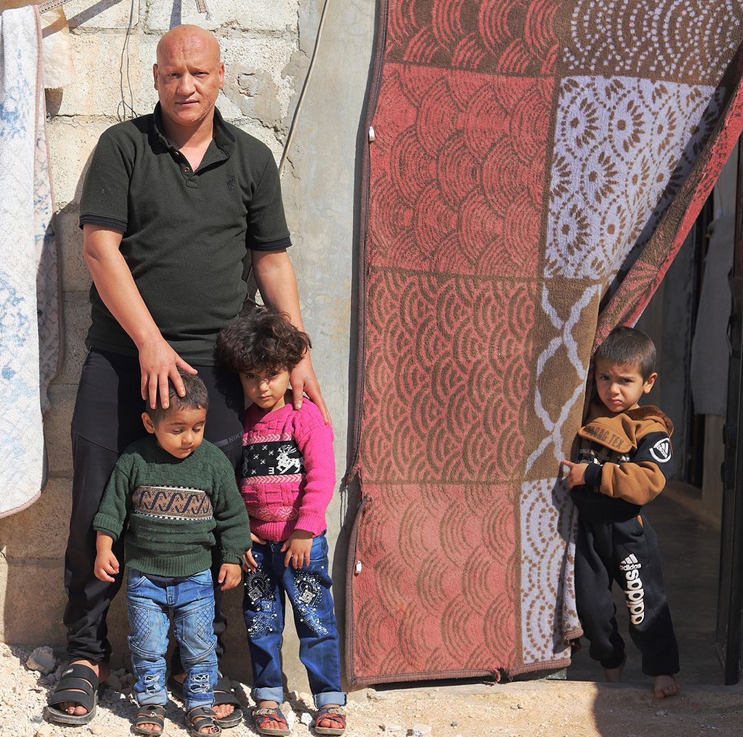 Kareem with his 2 sons and daughter at their new temporary home