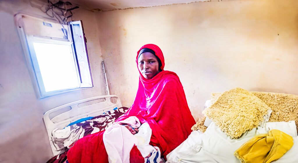 Expecting mother Salha in GOAL supported, Debakir village, primary health care facility
