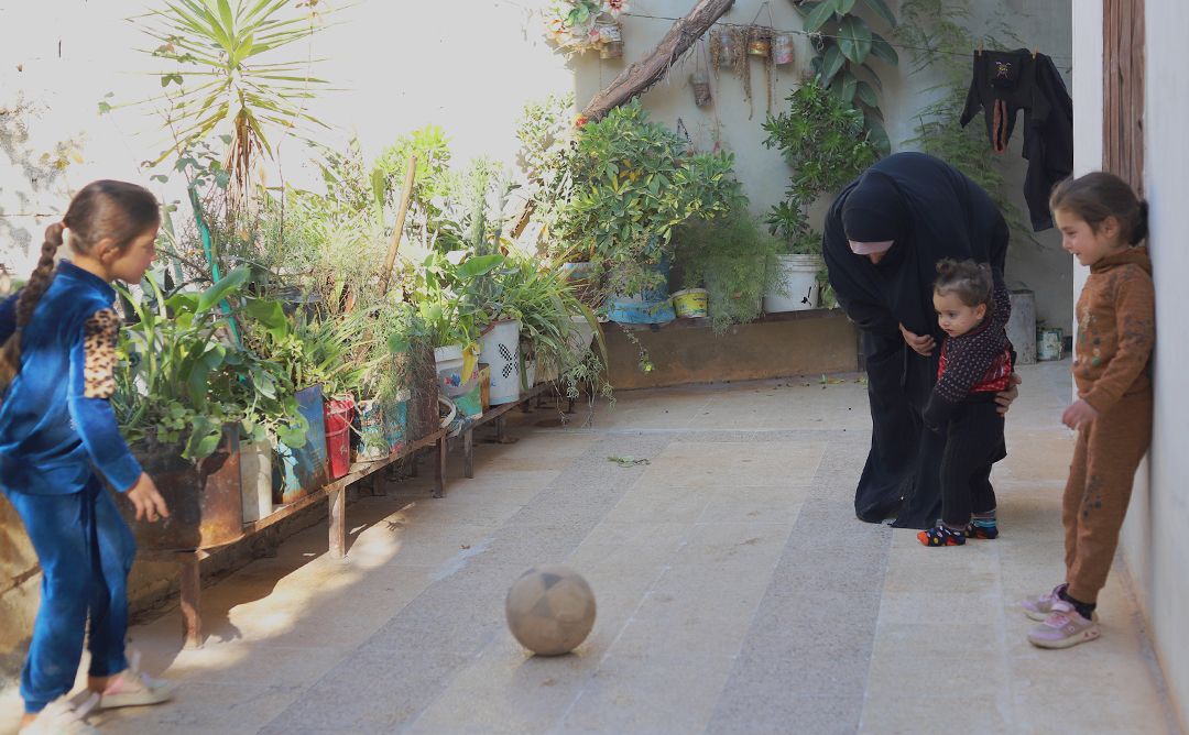 SANAD Cycle 2_SY_Amina Family_playing_body Amina's children and grandchildren can play peacefully and safely under the sunlight again.